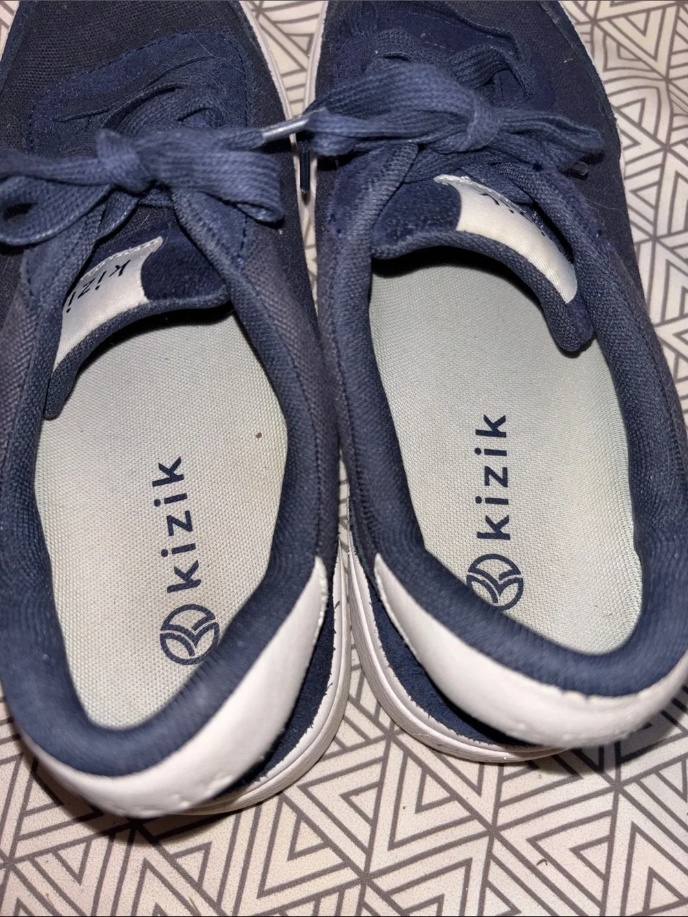 Navy Low-Top Canvas Sneakers with White Sole slide on.